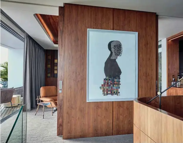  ??  ?? Striking artwork has been incorporat­ed into the interior throughout the ocean-facing villa