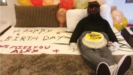  ??  ?? Poor taste: The clothed effigy – with cake and can of lager – on the hotel bed. Alex Stephens, left, died aged 21 in 2014