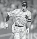  ?? ADAM HUNGER/USA TODAY SPORTS ?? Yankees right fielder Aaron Judge reacts after he hits a two-run double in the second inning against the Indians during Game 4 of an American League Division Series Monday at Yankee Stadium in New York.