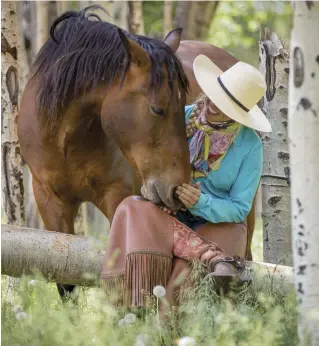  ??  ?? Madison recognizes that training mustangs poses a bigger challenge than working with domestic breeds might, but she welcomes the lessons she’s learned from them. “I love their raw, untamed spirit,” she says. “And you have to have so much more sensitivit­y to the animal.”