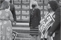  ?? JONATHON GRUENKE/STAFF ?? Dr. Jill Biden speaks with military families outside of a private residence Thursday in Norfolk, where she promised to relaunch the “Joining Together” initiative.