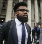  ?? JULIE JACOBSON — THE ASSOCIATED PRESS ?? Cowboys star Ezekiel Elliott walks out federal court Thursday in New York. of