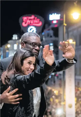  ??  ?? NOBEL Peace Prize laureates Denis Mukwege and Nadia Murad wave to people honouring them with a torch lit parade in Oslo, Norway December 10, 2018.