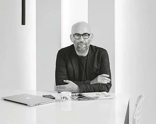  ??  ?? Lighting designer and entreprene­ur Davide Groppi in the kitchen of his house in Piacenza, Italy