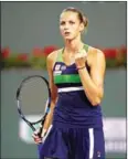  ?? CLIVE BRUNSKILL/GETTY IMAGES/AFP ?? Karolina Pliskova celebrates a point against Garbine Muguruza on Wednesday at Indian Wells.
