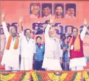  ?? PTI ?? PM Modi waves at the crowd during an election rally in support of BJP candidates, in Mahbubnaga­r, on Tuesday.