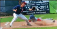  ?? KYLE MENNIG — ONEIDA DAILY DISPATCH ?? Sherrill Post’s Nate Palmer (22) dives safely into third as the throw gets away from Utica Post’s Brian Wojnas (15).