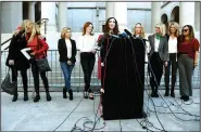  ?? (AP/Chris Pizzello) ?? Sarah Ann Masse speaks Tuesday at a news conference held by the “Silence Breakers” outside Los Angeles City Hall. Women in the group have alleged sexual misconduct by Hollywood producer Harvey Weinstein. Behind Masse (from left) are Caitlin Dulany, Rosanna Arquette, Lauren Sivan, Lauren O’Connor, Louisette Geiss, Melissa Sagemiller Nesic, Katherine Kendall and Larissa Gomes.