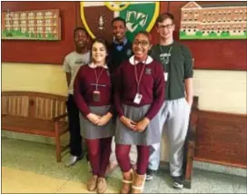  ?? PEG DEGRASSA – DIGITAL FIRST MEDIA ?? Bonner & Prendie students, left to right, (front), Gina Van Oster, Jaelyn Davis, (back) David Oladosu, Akindamola Peter-Koyi, and Michael Killian, stand in the school’s lobby under the Bonner & Prendie logo.