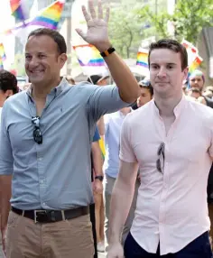  ??  ?? LONG MARCH: Taoiseach Leo Varadkar and his partner Dr Matt Barrett at the Montreal pride parade in 2017