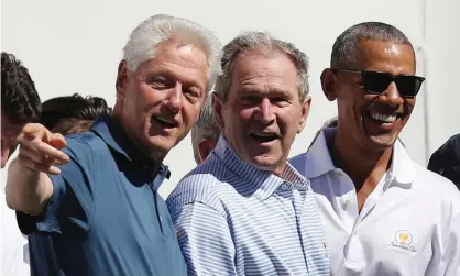  ?? Photograph: Andrew Gombert/EPA ?? Clinton, Bush and Obama in 2017. More than 3,100 people died from the coronaviru­s in America onWednesda­y, a record single-day high.