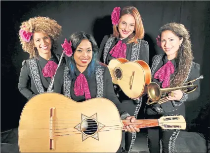  ?? KATHY WILLENS — ASSOCIATED PRESS ?? Domenica Fossati, left, Mireya Ramos, Shae Fiol and Julie Acosta are members of Mariachi Flor de Toloache, which will open the annual yerba Buena Gardens Festival this year.