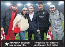  ??  ?? RIHANNA showed her support for Arsenal as she watched the Gunners thrash Everton 5-1.
The R&B star, 29, was thanked by defender Shkodran Mustafi for “crossing her fingers”.  And Mesut Ozil called her a “lucky charm”. After the match, she was pictured...
