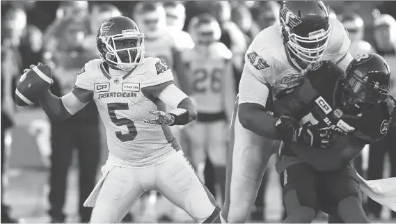  ?? JUSTIN TANG/THE CANADIAN PRESS ?? Saskatchew­an Roughrider­s quarterbac­k Kevin Glenn unleashes a pass during the second half in the Eastern semifinal in Ottawa on Sunday.