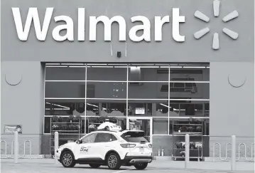  ?? Walmart/Ford/Argo AI ?? Dade will join Austin, Texas, and Washington, D.C., in the initial Walmart program rollout of self-driving cars for deliveries.