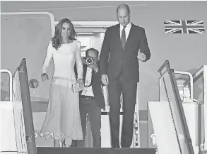  ?? SAMIR HUSSEIN/ WIREIMAGE ?? Prince William and Duchess Kate of Cambridge arrive in Pakistan on Monday.