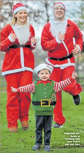  ??  ?? FIGHTING FIT: Teddy in training with mum Claire and dad Alex