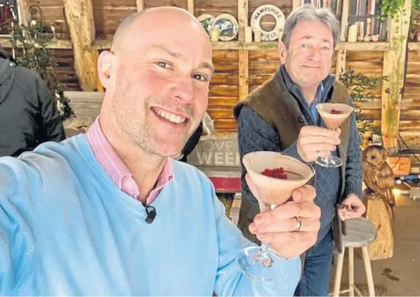  ??  ?? BERRY TASTY: Love Your Weekend presenters Andy Clarke, left, and Alan Titchmarsh sample the cocktail which contains the raspberry liqueur.