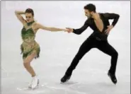  ?? ASSOCIATED PRESS ?? Gabriella Papadakis and Guillaume Cizeron of France perform during the ice dance, short dance figure skating in the Gangneung Ice Arena at the 2018 Winter Olympics in Gangneung, South Korea, Monday.