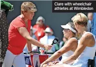  ?? ?? Clare with wheelchair athletes at Wimbledon