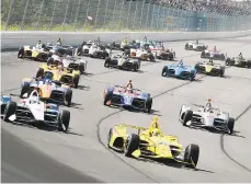  ?? MATT SLOCUM/AP ?? Cars head into a turn during Sunday’s ABC Supply 500 IndyCar race at Pocono Raceway.