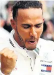  ??  ?? DELIGHT Lewis Hamilton