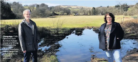  ??  ?? Campaign Colin Patterson from Burnfoot Action Group and Shona Finnie from the community council have been calling for the site at Burnfoot to be retained as greenbelt