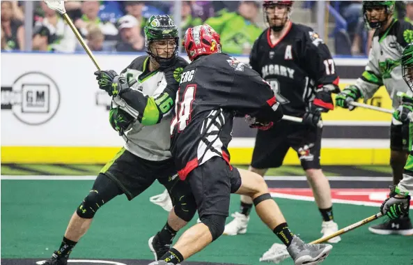  ?? MATT SMITH/FILES ?? Saskatchew­an Rush defender Chris Corbeil, left, not only captains the defending NLL champions but also serves as their player representa­tive.