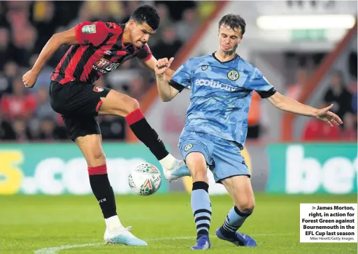  ?? Mike Hewitt/Getty Images ?? James Morton, right, in action for Forest Green against Bournemout­h in the EFL Cup last season