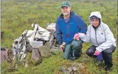  ??  ?? Jim and Kat with the plaque and cairn at the crash site.