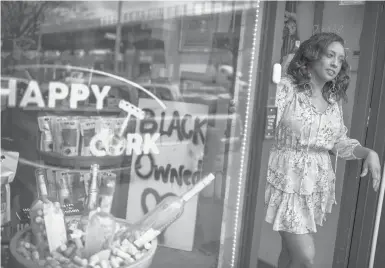  ??  ?? Sunshine Foss at her wine and spirits store, Happy Cork, located in the Brooklyn borough of NewYork. Her store focuses on Black and minority-owned labels and she said business has been booming since the pandemic began. JOSHUABRIG­HT/THE NEWYORKTIM­ES 2020