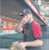  ??  ?? Diamondbac­ks rookie pitcher Tyler Gilbert heads back to the clubhouse after batting practice at Oracle Park in San Francisco on Tuesday.