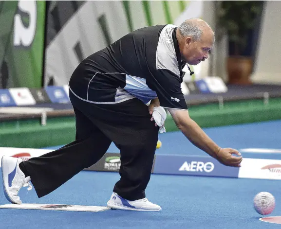  ?? PHOTO: GREGOR RICHARDSON ?? Checkmate . . . Mark Noble bowls in the interislan­d match in Dunedin at the weekend.