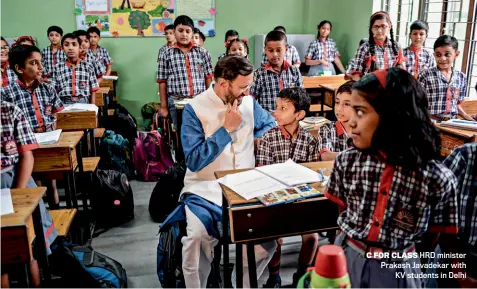  ?? CHANDRADEE­P KUMAR ?? C FOR CLASS HRD minister Prakash Javadekar with KV students in Delhi