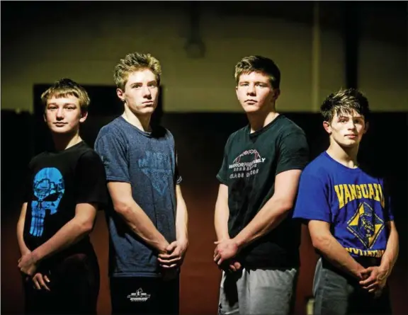  ?? NATE HECKENBERG­ER — FOR DIGITAL FIRST MEDIA ?? West Chester Henderson sends a team-record four wrestlers to the state tournament, with (from left to right) Sammy McMonagle, Luke Phayre and Ray Martin making their first trips and Killian Delaney going for a second time.