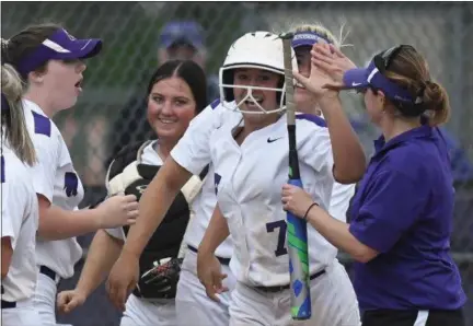  ?? ERIC BONZAR — THE MORNING JOURNAL ?? Keystone’s Autumn Acord (7) celebrates her two-run home run that put the Wildcats up 3-0 on Holy Name.