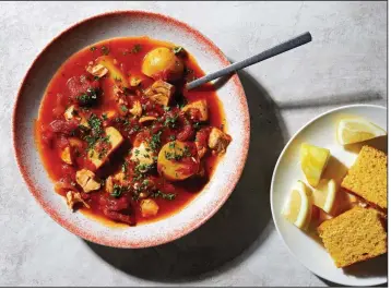  ?? For The Washington Post/STACY ZARIN GOLDBERG ?? Garlic and Tomato Fish Stew