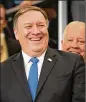  ?? CHIP SOMODEVILL­A/GETTY IMAGES ?? U.S. Secretary of State Mike Pompeo is welcomed to the State Department on Tuesday during a ceremony in the Harry S. Truman Building.