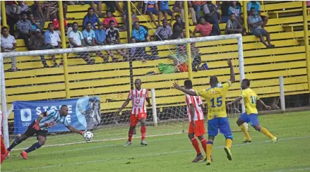  ?? Photo: Sampras Anand ?? Labasa goalkeeper Akuila Mateisuva saves a shot from Nadroga’s Gerard Voi at Subrail Park, Labasa on March 27, 2021. Labasa won 1-0.