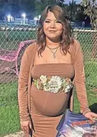  ?? PROVIDED BY THE TEXAS DEPARTMENT OF PUBLIC SAFETY ?? Savanah Soto, 18, was recently pictured looking like a beaming mother-to-be, smiling in a figure-hugging dress with flowers draped over her tummy.