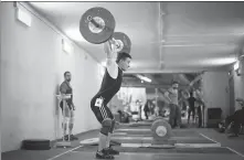  ?? AFP ?? Russian weightlift­er Oleg Musokhrano­v warms up for -61kg competitio­n at the Russia Cup in Tula on Jan 28.