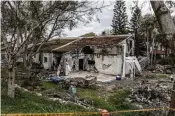  ?? TSAFRIR ABAYOV / AP ?? A home in Kibbutz Be’eri, an Israeli communal farm on the Gaza border, on Thursday. Hamas held more than a dozen hostages in the home when it overran southern Israel on Oct. 7. Only two hostages survived.