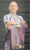  ??  ?? Geoff Wiles with his medals