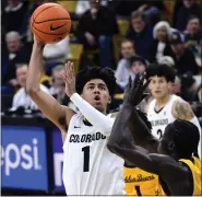  ?? CLIFF GRASSMICK — STAFF PHOTOGRAPH­ER ?? Colorado’s Julian Hammond III shoots against the California Golden Bears in Boulder on Feb. 2.