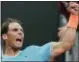  ?? ANDREW MEDICHINI — THE ASSOCIATED PRESS ?? Rafael Nadal celebrates after defeating Stefanos Tsitsipas at the Italian Open in Rome on Saturday. Nadal won 6-3, 6-4.