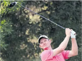  ??  ?? Justin Rose plays a shot during the first round at Jumeirah Golf Estates in Dubai.