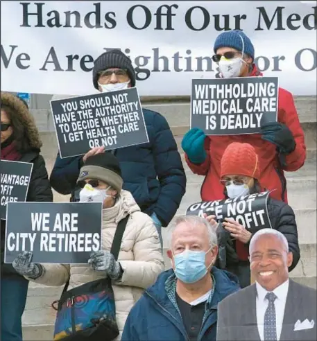  ?? ?? Retired municipal workers rally in December 2021 in Brooklyn in bid to preserve their Medicare coverage.