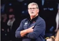  ?? John Bazemore / Associated Press ?? Geno Auriemma and the Huskies’ game against Marquette on Wednesday has been canceled due to COVID-19 issues in the Marquette program.