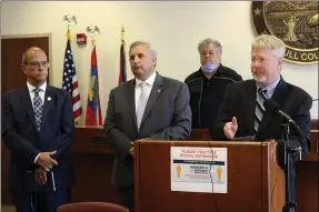  ?? STEVE PETERSON ?? State Sen. Sean O’Brien, D-Bazetta, right, is joined by state Reps. Gil Blair, D-Weathersfi­eld, left center, and Michael O’Brien, D-Warren, left, during a news conference in Warren. The three are calling for the immediate repeal of the nuclear plant bailout law at the center of a bribery scandal surroundin­g Republican Ohio House Speaker Larry Householde­r.