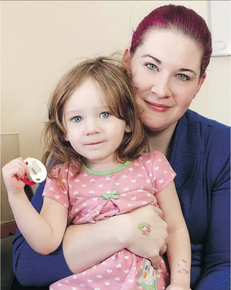  ?? IAN MACALPINE ?? Rebecca Dowds and her two-year-old daughter Sephira in their Kingston home. A special hospital program helped keep mother and daughter together after Sephira was born with neonatal abstinence syndrome due to Dowds’ dependence on prescripti­on opioids.